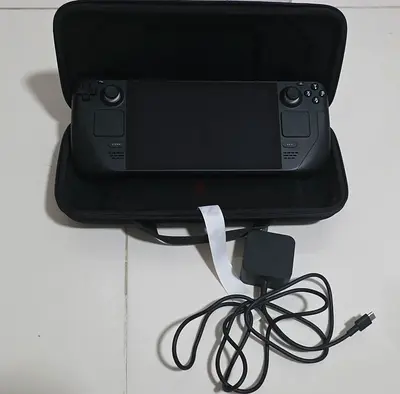 Steam Deck LCD 256 GB (handheld PC) with carry case and charger - good condition