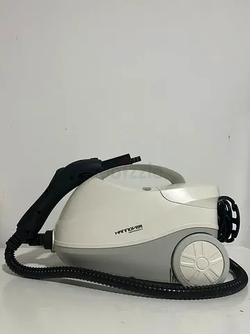 Hannover Germany steam cleaning machine, complete with accessories and a convenient carrying case.