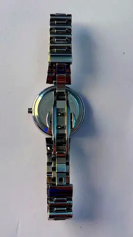 Silver stainless steel wristwatch - good working condition