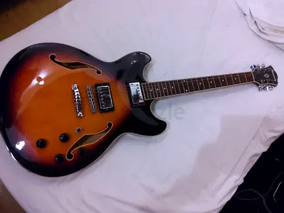 Ibanez AS73 , great guitar for the money.