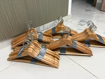 Set of 20 wooden clothes hangers with chrome hooks - like new