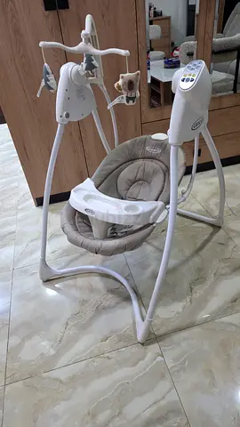 Graco baby swing with toy mobile electric swing, gently used