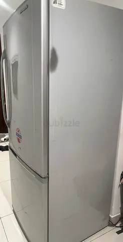 Used silver refrigerator - good working condition, single owner
