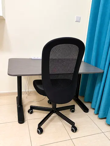 IKEA adjustable desk with mesh office chair - good condition