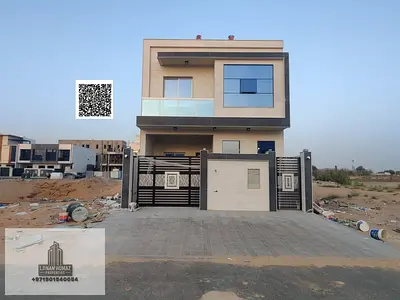 فيلا للبيع في عجمان منطقه الحليو شامل رسوم التسجيل 5 غرف ماستر ومجلس وصاله وغرفه و روف خادمه مع امكانيه التمويل البنكي