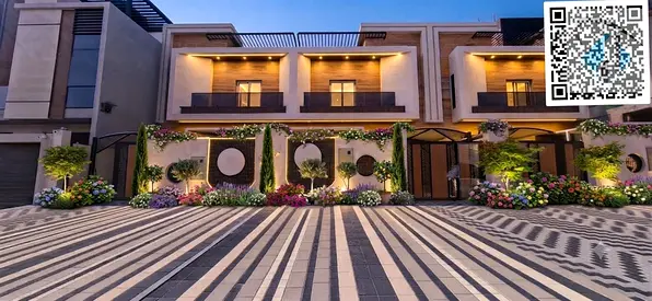 For sale in Al Helio 2, near the Azha roundabout: a luxurious townhouse-style villa. The villa and its perimeter wall feature a stone facade. It is si