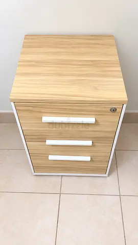 3-drawer storage cabinet in light wood and white