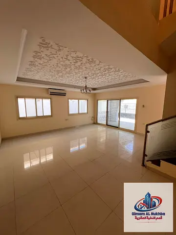 A two-story villa in the Al-Rifa'a area, featuring 5 bedrooms with built-in closets (including a ma