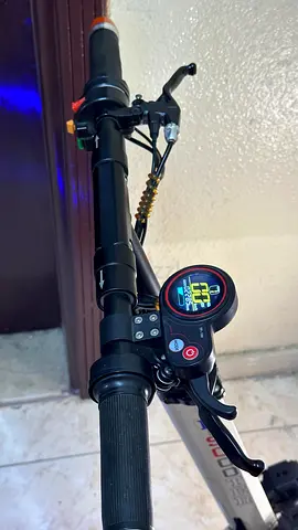 Used electric scooter — working display and brakes, good condition