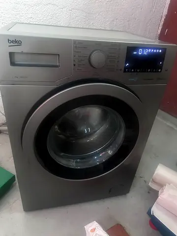 Beko front load washing machine - 7kg, silver, good working condition