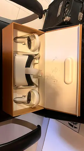 Meta Quest 2 (white) VR headset with controllers - good condition (no plastic cover on one remote)