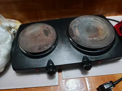 Used double electric hot plate cooker, 2-burner (needs cleaning)