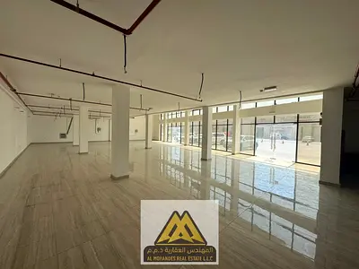 Spacious Showroom with Mezzanine for Rent Large Showroom with Mezzanine Suitable for Exhibitions and Various Large Commercial Activities Total Area: