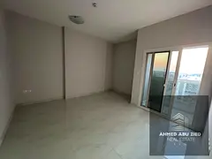 A family-friendly apartment available for annual rent in a prime, vibrant location in Al Jurf 3, nea