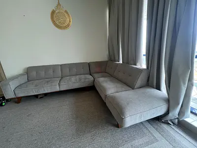 L-shaped grey fabric sectional sofa - good condition