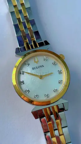 My Bulova two-tone women's watch with diamond markers - good condition