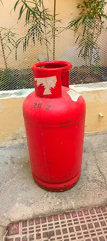 Used red LPG gas cylinder
