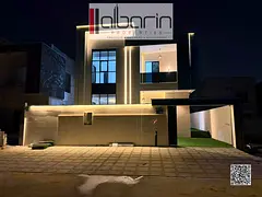 Luxurious modern villa in Al Helio 2, featuring 4 bedrooms, a majlis, two living areas, and central