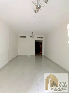 Three-bedroom apartment with a living room in Al Majaz, Sharjah; includes a balcony, parking, and on