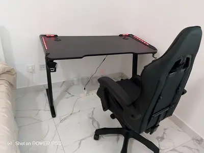 Gaming desk with RGB lights and ergonomic gaming chair - ready to use