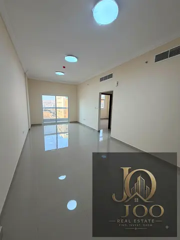 Brand-new spacious 1-bedroom apartment with a living room, two bathrooms with showers, and an open view in Al Jurf 3, Ajman. AED 33,000 per year, paya