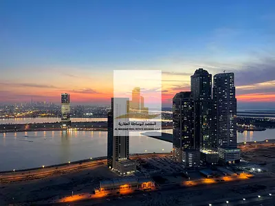 One-bedroom apartment with a living room for rent in Al palm Tower 1 full view of Al Mamzar
