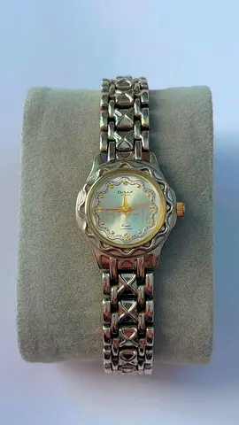 Classic OLAX stainless steel women's wristwatch — good working condition