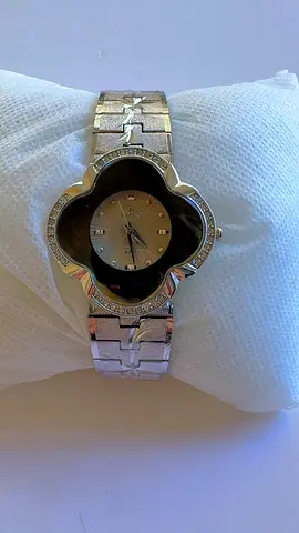 Silver floral-shaped women's wristwatch with crystal accents
