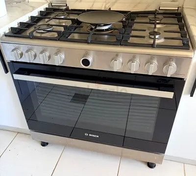 Bosch 90cm Stainless Steel Gas Range with Oven with fan urgent sell  Good Condition