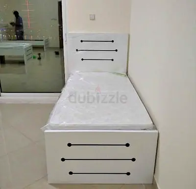 Single white wooden bed with headboard and storage drawer - good condition