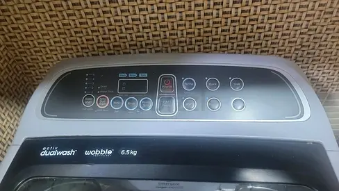 Samsung top loaded wobble washing machine for urgent sale