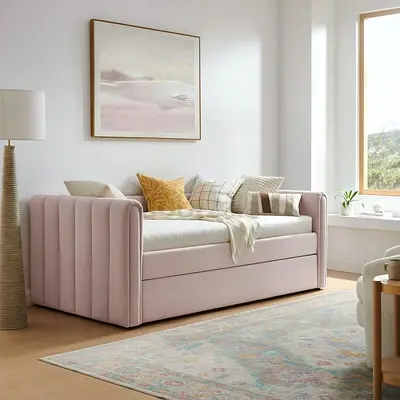 Pink upholstered daybed with trundle - good condition