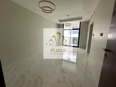 Annual rental in Al Hamidiyah, Ajman. First-occupancy 2-bedroom apartment with balcony, central AC