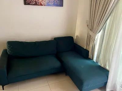 Dark blue L-shaped sofa chaise, good condition