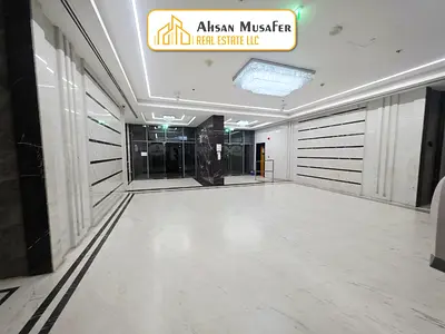 ONE MONTH FREE//NEW BUILDING//PARKING FREE+1BHK WITH 2WASHROOMS NEAR BY AL NAHDA PARK//1BHK WITH WASHROOMS//One-bedroom apartment with a spacious living room, offering flexible payment plans, convenie