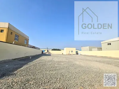 60 KW Power Industrial Yard for Rent in Umm Al Quwain Main Road Access Two Gates