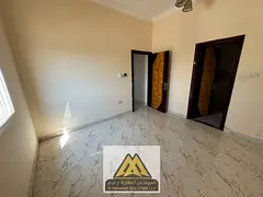 Annual rental apartment in Al Mowaihat 2, Ajman. 2 bedrooms, living room, 2 bathrooms, split AC, nea