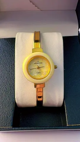 Gold-tone Jordan Kerr women's quartz bangle watch - good condition