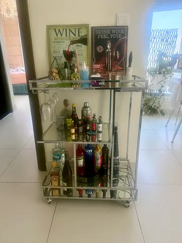 Chrome bar trolley with glass shelves — used, good condition