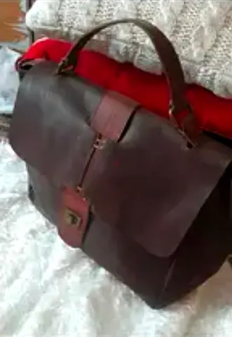 Brown leather satchel briefcase with top handle — used, good condition