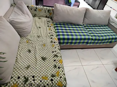 Large L-shaped fabric sofa with removable covers - good condition