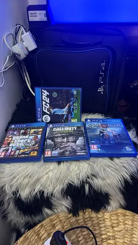 Sony PS4 Slim with 4 Games (GTA V, FIFA 14, Call of Duty, $%& of War) 1 TB with free bag