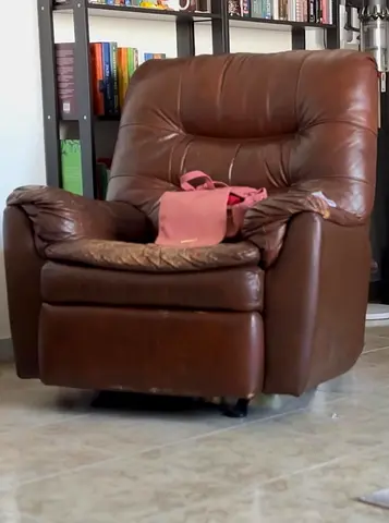 AED 50 CASH BACK - URGENT SALE: Brown leather recliner armchair - Self Pickup Only