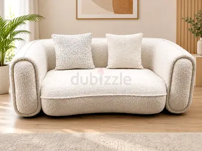 Cream boucle 2-seater sofa in good condition