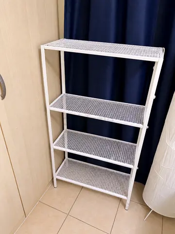 White metal shelving unit with 4 shelves