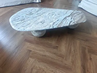 Low marble coffee table with rounded base — solid stone top and Base