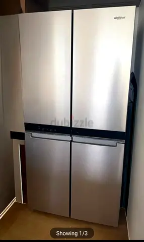 Whirlpool 4-Door Stainless Steel Refrigerator - Good Condition