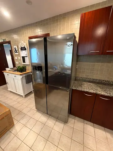 LG Stainless Steel Double Door Refrigerator with Water Dispenser - Good Condition