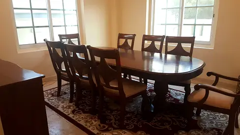 Solid Wood 8-Seater Dining Table with Chairs - Classic Design in good condition