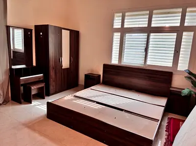 Dark wood 5-piece bedroom set: bed frame, wardrobe, dresser, 2 nightstands.